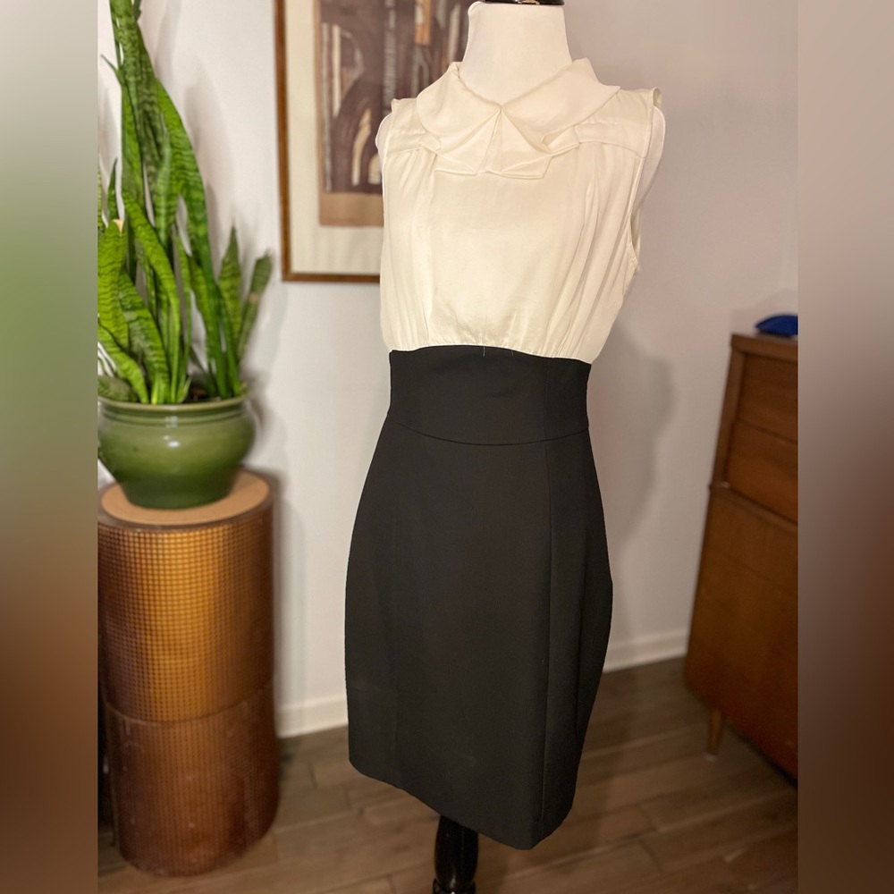 Limited sz 4 dress. Perfect for office.